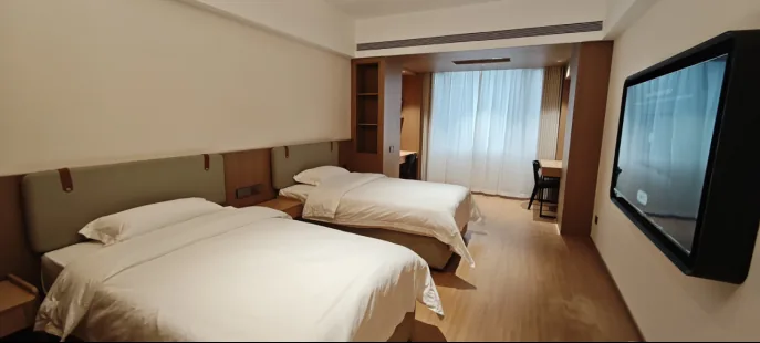 A twin room in the hotel on campus